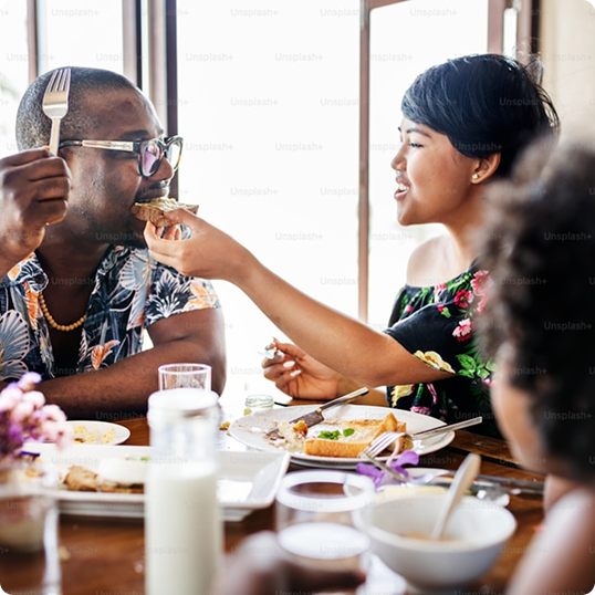 People enjoying a meal together at a restaurant